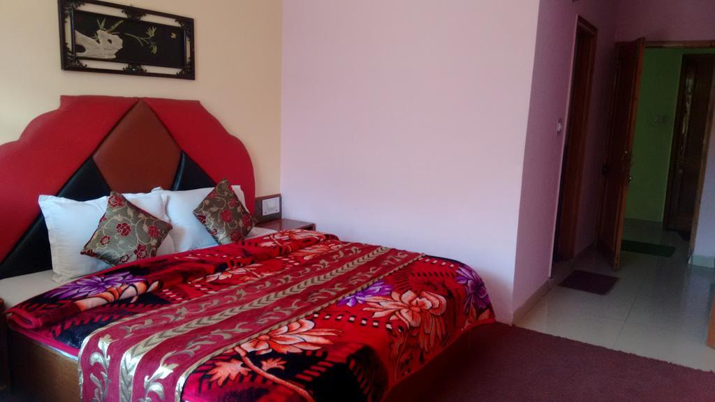 Chichoga Holiday Inn Manāli Quarto foto